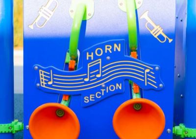 A playground toy allowing kids to emulate a horn instrument.