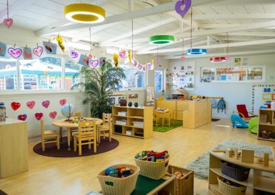 A large, Safari Kid classroom with multiple learning areas for the children and teachers.